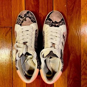 Dolce vita sneakers size 8.5. Only worn a couple times.